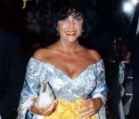Elizabeth Taylor et Larry Fortensky, le 1er décembre 1997 à Los Angeles (archives).