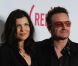 Bono, entouré des trois femmes de sa vie, fait un cadeau aux paparazzi