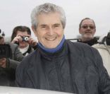 Claude Lelouch, souriant et ravi, participait à la 12e Traversée de Paris, le 8 janvier 2012.