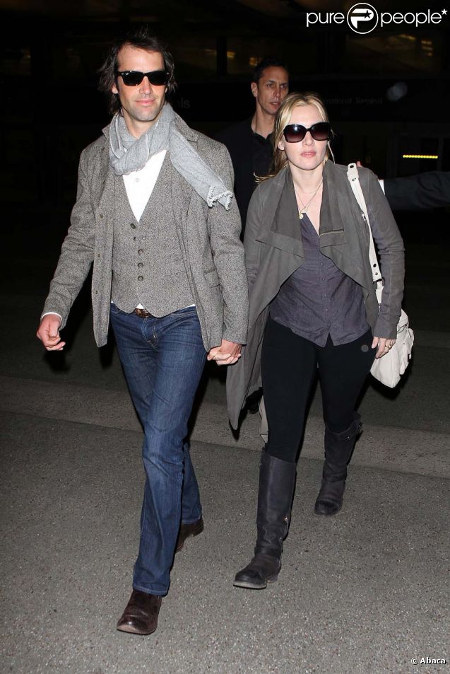 Kate Winslet et son chéri Ned Abel Smith à l'aéroport de Los Angeles, le 13 janvier 2012.