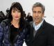 Le réalisateur Rachid Bouchareb et sa compagne ont assisté au défilé Dior Homme automne-hiver 2012/2013 à Paris, le 21 janvier 2012.