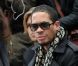 Le rappeur/acteur JoeyStarr était au premier rang du défilé Dior Homme à Paris, le 21 janvier 2012.
