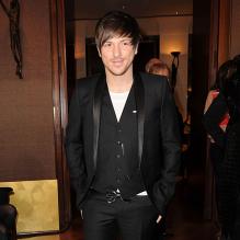 Le chanteur-DJ Quentin Mosimann était présent au défilé Eric Tibusch à Paris, le 23 janvier 2012.