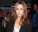 La star de téléréalité américaine devenue blogueuse Olivia Palermo, stylée comme toujours pour assister au défilé Marchesa. New York, le 15 février 2012.
