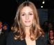 La star de téléréalité américaine devenue blogueuse Olivia Palermo, stylée comme toujours pour assister au défilé Marchesa. New York, le 15 février 2012.