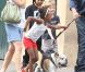 Shiloh, Zahara et Maddox, les enfants de Brad Pitt et Angelina Jolie,  avec leur nounou et garde du corps à la Nouvelle-Orléans le 7 mars 2012