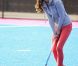 Catherine, duchesse de Cambridge a montré ses talents de hockeyeuse lors de sa rencontre avec l'équipe olympique britannique à l'Arena Riverside, sur le site des JO de Londres, le 15 mars 2012. 