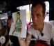 Joël montre la photo du maire dans Pékin Express 2012, mercredi 6 juin 2012 sur M6
