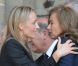 Valérie Trierweiler présente ses condoléances à la veuve aux obsèques d'Olivier Ferrand en l'église Saint-Sulpice, à Paris, le 4 juillet 2012.