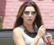 Eva Longoria fait le plein de sa Bentley à Culver City, le 14 juillet 2012.