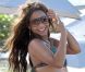 Les courbes de Christina Milian sur une plage de Miami, le 20 juillet 2012.