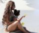 Moment de complicité pour Christina Milian et sa fille Violet sur une plage de Miami, le 20 juillet 2012.