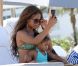 Christina Milian et sa fille Violet sur une plage de Miami, le 20 juillet 2012.