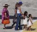 Laeticia Hallyday, Mamie Rock, Jade et Joy, arrivent sous le beau soleil de Saint-Barthélémy, le vendredi 27 juillet 2012.