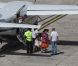 Laeticia Hallyday, Mamie Rock, Jade et Joy, arrivent sur l'île de Saint-Barthélémy, le vendredi 27 juillet 2012.