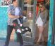 Hilary Duff se rend dans un magasin de déco d'intérieur avec son époux Mike Comrie, le samedi 28 juillet 2012. Leur fils Luca, niché dans son landau, apparaît sage et calme.