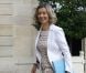 La ministre déléguée aux Français de l'étranger Hélène Conwey-Mouret, souriante à son arrivée à l'Élysée pour le premier conseil des ministres de la rentrée. Paris, le 22 août 2012.