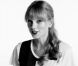 Taylor Swift, déjà enthousiaste à l'idée de se rendre à la Fashion's Night Out dans la soirée du jeudi 6 septembre.