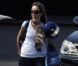  EXCLU : Calista Flockhart sur le tarmac avant son départ en week-end en jet privé avec son mari Harrison Ford et leur fils Liam, à Los Angeles, le 31 août 2012 