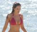 Kelly Brook, sublime en bikini, sur une plage paradisiaque, le 29 avril 2010.