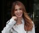 Poppy Montgomery, sexy en rousse, joue les femmes fatales à Paris