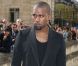 Kanye West tout en noir et chaussé d'Air Jordan 1, arrive à l'Hôtel National des Invalides pour assister au défilé prêt-à-porter Christian Dior printemps-été 2013. Paris, le 28 septembre 2012.