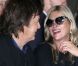 Kate Moss hilare avec Sir Paul McCartney lors du défilé Stella McCartney printemps-été 2013 à l'Opéra Garnier. Paris, le 1er octobre 2012.