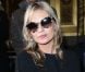 Kate Moss assiste du premier rang au défilé Stella McCartney printemps-été 2013 à l'Opéra Garnier. Paris, le 1er octobre 2012.