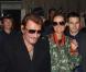 Johnny Hallyday et Laeticia à leur arrivée à l'aéroport de Paris Charles-de-Gaulle, le 9 octobre 2012.
