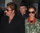 Johnny Hallyday et Laeticia à leur arrivée à l'aéroport de Paris Charles-de-Gaulle, le 9 octobre 2012.