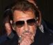 Johnny Hallyday à son arrivée à l'aéroport de Paris Charles-de-Gaulle, le 9 octobre 2012.