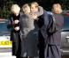 Le prince William avec les proches de la défunte, le 10 octobre 2012 aux obsèques de son ancienne nounou, Olga Powell, au cimetière de Parndon Wood, à Harlow, dans l'Essex (nord-est de Londres).