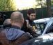 Nikola Karabatic lors de son interpellation à la sortie du stade Pierre de Coubertin le 30 septembre 2012 après le match entre le PSG et Montpellier à Paris