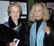 Brigitte Fossey et Christine Pinoteau posent devant les photographes pour un hommage rendu à Claude Pinoteau au cinéma Le Village à Neuilly sur Seine, le 7 janvier 2012.