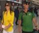 Elizabeth Hurley et son compagnon Shane Warne, à l'aéroport de Perth, en Australie, le 16 janvier 2013.