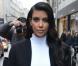 Kim Kardashian habillée en Stéphane Rolland et chaussée de souliers Céline à Paris. Le 22 janvier 2013.