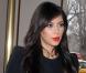 Kim Kardashian arrive au restaurant Cipriani restaurant à New York, habillée d'une robe manteau Alexander McQueen, d'un sac Hermès et des souliers Jimmy Choo. Le 15 janvier 2013.