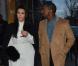 Kim Kardashian porte un manteau et une jupe Lanvin, un chemisier Alexander McQueen et des sandales Céline pour une nouvelle séance shopping avec Kanye West. Paris, le 11 janvier 2013.