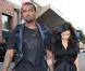 Kim Kardashian, stylée en robe et bottes noirs accessoirisés d'une pochette Dolce &amp; Gabbana, se rend au restaurant Chin Chin avec son compagnon Kanye West. Los Angeles, le 23 décembre 2012.