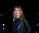 Emmanuelle Seigner arrive au défilé prêt-à-porter automne-hiver 2013-2014 d'Yves Saint Laurent. Le défilé s'est déroulé au Grand Palais à Paris, le 4 mars 2013.