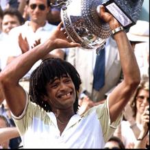 <p>Yannick Noah lors de sa victoire à Roland-Garros le 5 juin 1983</p>