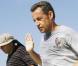 PHOTOS : Carla Bruni et Nicolas Sarkozy, des vacances oui, mais pas de tout repos...