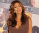 Eva Mendes en sandales compensées, sa marque de fabrique