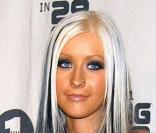 Christina Aguilera en 2002 à Los Angeles. Une allure d'adolescente plutôt maquillée et une taille de guêpe. 