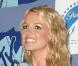 Britney Spears en septembre 2008 aux MTV awards arbore une mine resplendissante, normal, elle a trois prix dans les bras ! 