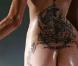 Angelina Jolie et son fameux dragon qui part du bas du dos au bas des fesses...