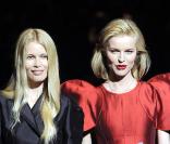 Claudia Schiffer et Eva Herzigova au défilé prêt-à-porter Dolce&Gabbana à Milan, le 2 mars 2009