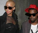 Amber Rose et Kanye West, lors du défilé de la collection automne/hiver 2009-2010 de prêt-à-porter de la maison Givenchy, le 8 mars 2009, à Paris.