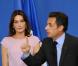 Nicolas Sarkozy, attentivement observé par Carla Bruni, faisant un discours devant les membres de la communauté française du Mexique dans une école française à Mexico le 9 mars 2009