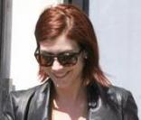 Kate Walsh est parfaite avec sa paire de bottines noires et sa mini taille haute ! 